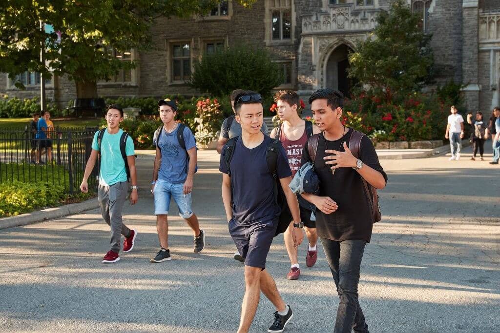 Photo of students walking on campus